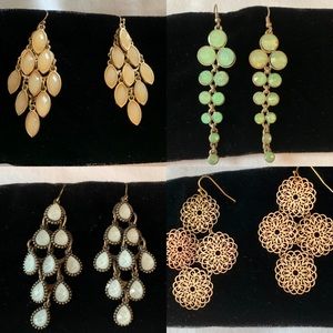 Multiple pairs of earrings.